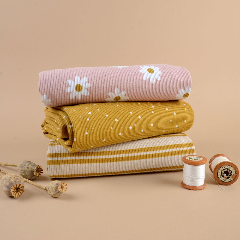 Jersey côtelé bio équitable à motif marguerite rose pâle