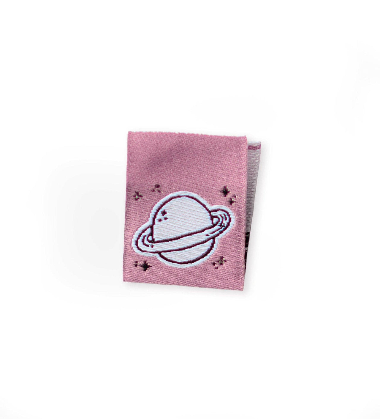 Weblabel von Paul und Clara mit Planet auf rosa Hintergrund.